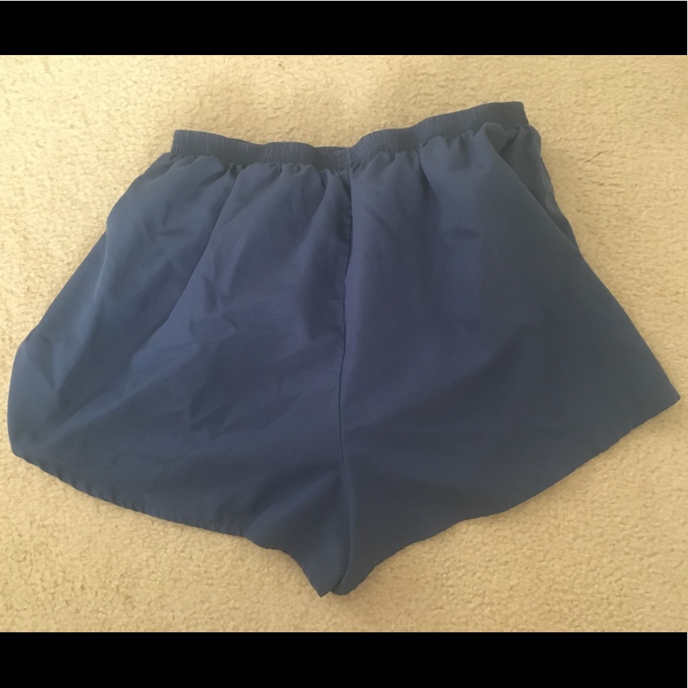 size medium dark blue aspire shorts